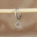 Detailed close-up of a silver hoop earring featuring a pavé zircon letter Q pendant - 1 Piece / Silver-Letter Q