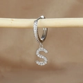 Macro shot of silver letter S earring with micro-pave zircons hanging on a wooden branch - 1 Piece / Silver-Letter S