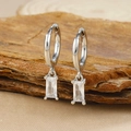 Macro shot of silver geometric earrings with rectangular zircons on dark wood background - Silver Rectangle White Zircon Pendant Hoop Earrings (Y20278)