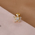 Macro shot of gold stainless steel star cartilage stud with cubic zirconia and screw back - Gold Star Style (Y20407-10)