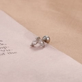 Macro shot of silver butterfly stud earring with marquise cut stones and screw ball back - Silver White V-Shaped Leaf Style (Y20284)