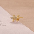 Detailed close-up of a gold-plated lizard stud earring with micro-set white cubic zirconia - Gold White Zirconia Lizard Style (Y20437)