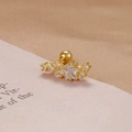 Macro detail of a gold-plated star helix stud with cubic zirconia and screw-back - Gold White Zirconia Pentagram Arc Style (Y26278)