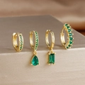 Detail of four-piece gold earring set with rectangular and pear-shaped green zircons - 4-Piece Set / Green