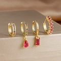 Macro view of four gold-plated earrings with red zircons and rectangle pendants - 4-Piece Set / Colorful