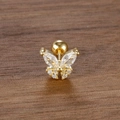 Primer plano de piercing de mariposa dorada con cristales de circón sobre fondo oscuro - Dorado-Blanco (Solo)