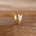 Detailed view of butterfly gold earring with marquise cubic zirconia on wood - Style 4 Butterfly (4-Gold-White-1pc)