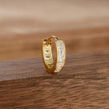 Macro shot of gold-plated hoop earrings with channel-set square zirconia on wood - Style 13 Channel Square (13-Gold-White-1pc)