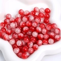 Vibrant red ice-crack glass beads for DIY jewelry making in a white ceramic dish - 10mm (20 Pieces/Pack) / Red And White Split