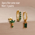 Three-piece gold ear set with emerald green stones featuring flower petals and square charms - Four-Petal Flower Geometric Collection (E1619) / Gold Green