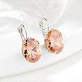 Eleganti orecchini a perno con zaffiro ovale champagne e placcatura in argento - Champagne
