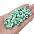 Macro detail of green and white patterned ceramic beads for DIY jewelry making - 2 Pieces/Pack / Graffiti Green