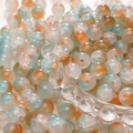 DIY round glass beads with orange and teal ink splash ice crackle effect - Blue and Orange