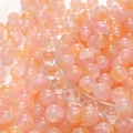 Polished round dual-tone crackle glass beads in pink and orange for DIY jewelry - Orange