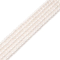Close-up of four parallel strands of creamy white round glass pearls for DIY jewelry - 3mm / 20 Pieces Set / White