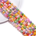 Macro detail of irregular multi-colored shell beads for DIY jewelry and necklace crafting - Approx. 50 Pieces/Pack (7-8mm) / Light Mixed Colors 2