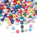 Mix of colorful ceramic spacer beads for DIY jewelry making in various vibrant colors - 4x6mm Spacer Bead Multicolor (10 Pieces/Pack) (BCD007)