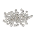 Macro shot of silver plated copper crimp beads and metal spacers for DIY jewelry making - 1.5mm / 500 Pieces/Pack / White Gold