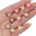 Macro view of transparent acrylic butterfly beads with gold foil for DIY jewelry - Butterfly Shape Butterfly Pattern / 11mm (10 Pieces/Pack) / Multicolor