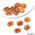 Macro detail of amber acrylic beads with gold floral borders for jewelry making, 13x18mm - 13x18mm / Square Mirror Shape / 20 Pieces Set / Amber