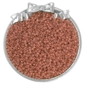 Top view of high-quality cinnamon seed beads neatly arranged in a silver metal display tray - 10g/Pack (Approx. 300 pcs) / Crimson