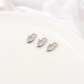 Polished stainless steel lobster clasps for jewelry making displayed on white silk - 8x15mm Rectangle Clasp (1 Piece/Pack)