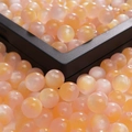 DIY jewelry beads in peach pink and pale yellow gradient with resin cat-eye finish - Orange Pink