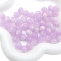 Macro shot of light purple translucent resin star beads with shimmer for DIY jewelry - 11x8mm / 10Pcs/Pack / Light Purple