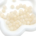Creamy white semi-transparent starry resin beads for DIY jewelry and necklaces - 11x8mm / 10Pcs/Pack / Beige