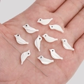 White bird-shaped natural shell loose beads for DIY handmade jewelry crafts - Aperture Approx 0.5mm White / Bird