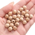 Natural wood beads with distinct grain for DIY jewelry making displayed in hand - 10mm (30 Pieces/Pack) / Beech Wood