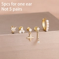 Set of 5 minimalist gold earrings with butterfly, star, and pearl charms for one ear - Gold Pearl Style (Y27135)
