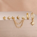 Detailansicht goldener Piercingsets mit Stern-, Blitz-Steckern und Zirkonia-Akzenten - Gold And White Style (Y27278)