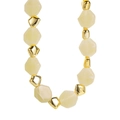 Macro detail of fashionable colorful beaded necklace with yellow faceted resin and gold beads - Necklace / Off White