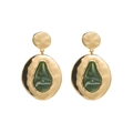 Detail of gold hammered metal earrings featuring a pear-shaped dark green resin inlay - Green
