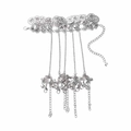 Detail of silver bohemian finger bracelet with vintage coins and small bell charms - Antique Silver