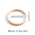 Detalle del brazalete de acrílico crema con textura de mármol y diámetro de 6,5 cm - Estilo Redondo Mármol Crema (B3442)