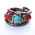Detail of bohemian multilayer bracelet featuring turquoise stone and vintage copper beads - B0229