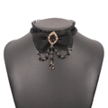 Detail view of gothic lace choker with black bow, beads and golden crescent moon pendant - Black