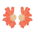 Detailed macro view of coral orange enamel flower earrings with golden textured metal finish - Orange