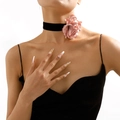 Detail of a large pink satin flower choker necklace with a black velvet ribbon strap - Light Pink Vintage Velvet Flower Choker (N10862)