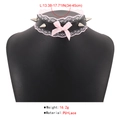 Detail of punk PU leather choker with pink lace, satin bow, and silver cone studs - Bright PU Leather Pink Lace Metal Cone Rivet Style (N10283)