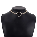 Macro view of gold choker necklace featuring a double-row rhinestone band and heart pendant - Gold