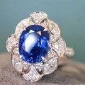 Luxurious royal blue sapphire open ring with oval gemstone and floral diamond halo - US 7 / Blue