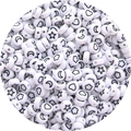 Detailed macro view of white acrylic star and moon pattern flat round beads for DIY jewelry - 100pcs Pack / White with Black Pattern