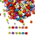 Macro detail of colorful square acrylic beads with black zodiac symbols for DIY jewelry - 15g Pack (Approx. 50 Pcs) / Solid Color Black Line