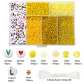Gelbes DIY Perlen Set mit Buchstabenperlen, 3mm Glasperlen und elastischer Schnur - Gelbe Serie (6 Raster)