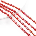 Detailed close-up of faceted bright red glass pagoda beads for DIY jewelry making - 7x4mm (68 Pieces/Pack) / Red