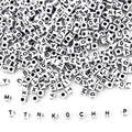 Detailed macro of 5mm white acrylic square letter beads with black text for DIY jewelry - White Base Black Font