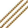 Detailed view of polished golden metal beads for jewelry making and DIY crafts - 2mm (1mm Hole, Approx. 165 Pieces) / Gold